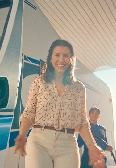 Famiglia camperisti campagna di Brand Q8